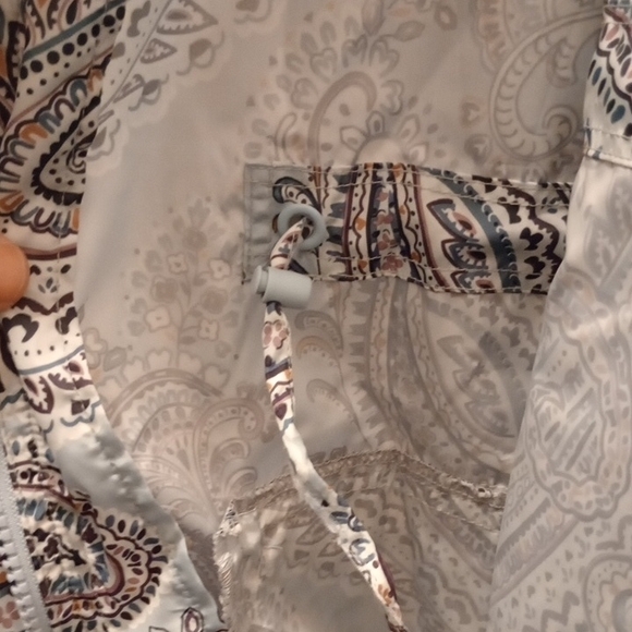 Vera Bradley Packable Raincoat in the Soft Sky Paisley pattern.  - Picture 5 of 7